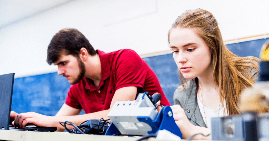 College engineering students working on a senior capstone prototype